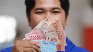 Rupiah Menguat Tipis, Didorong Meredanya Tekanan Geopolitik dan Turunnya Harga Minyak